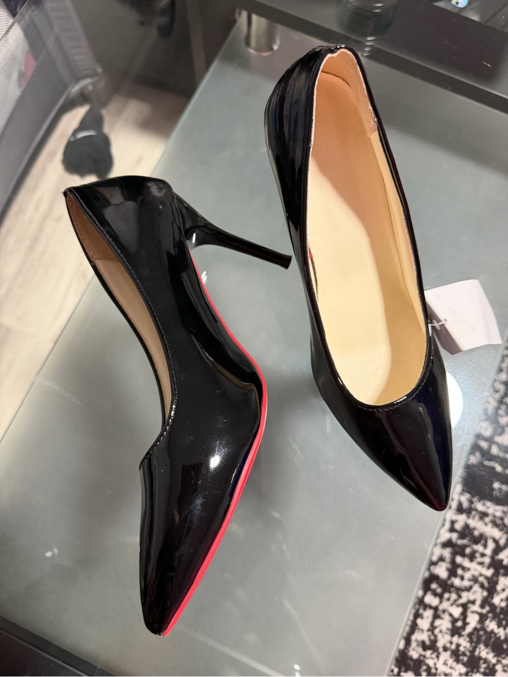 Patent Black Pointed-Toe Stiletto Heels with Red Sole Accent